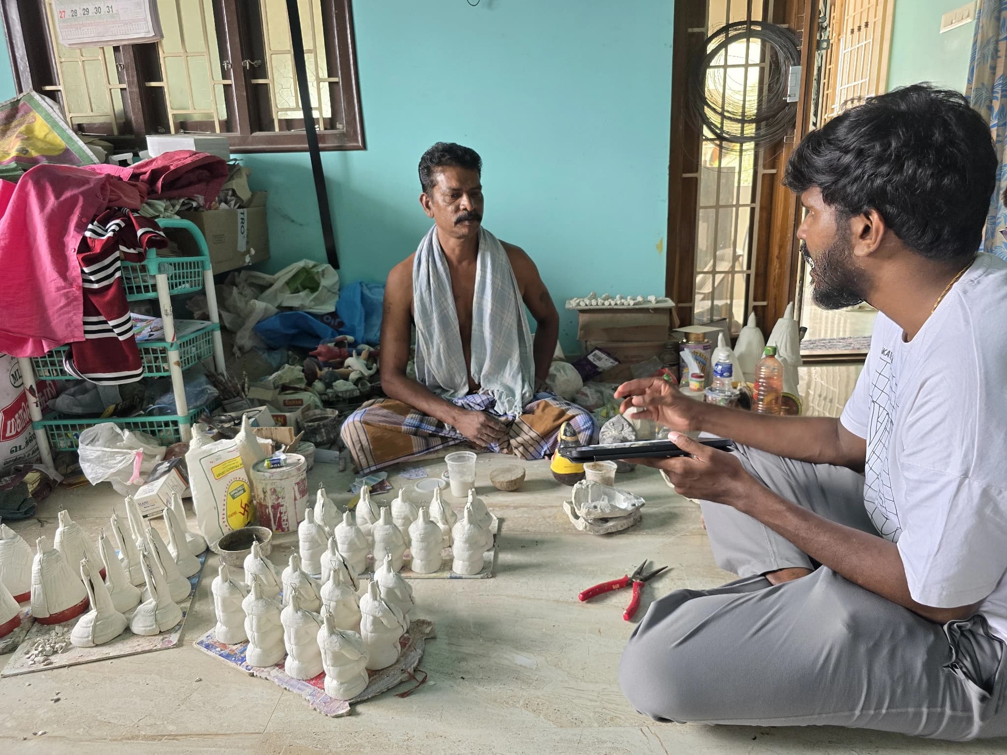 Doll maker in his Thanjavur workshop, shot on the weekend